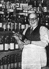 image of John Cox behind the bar 1947.